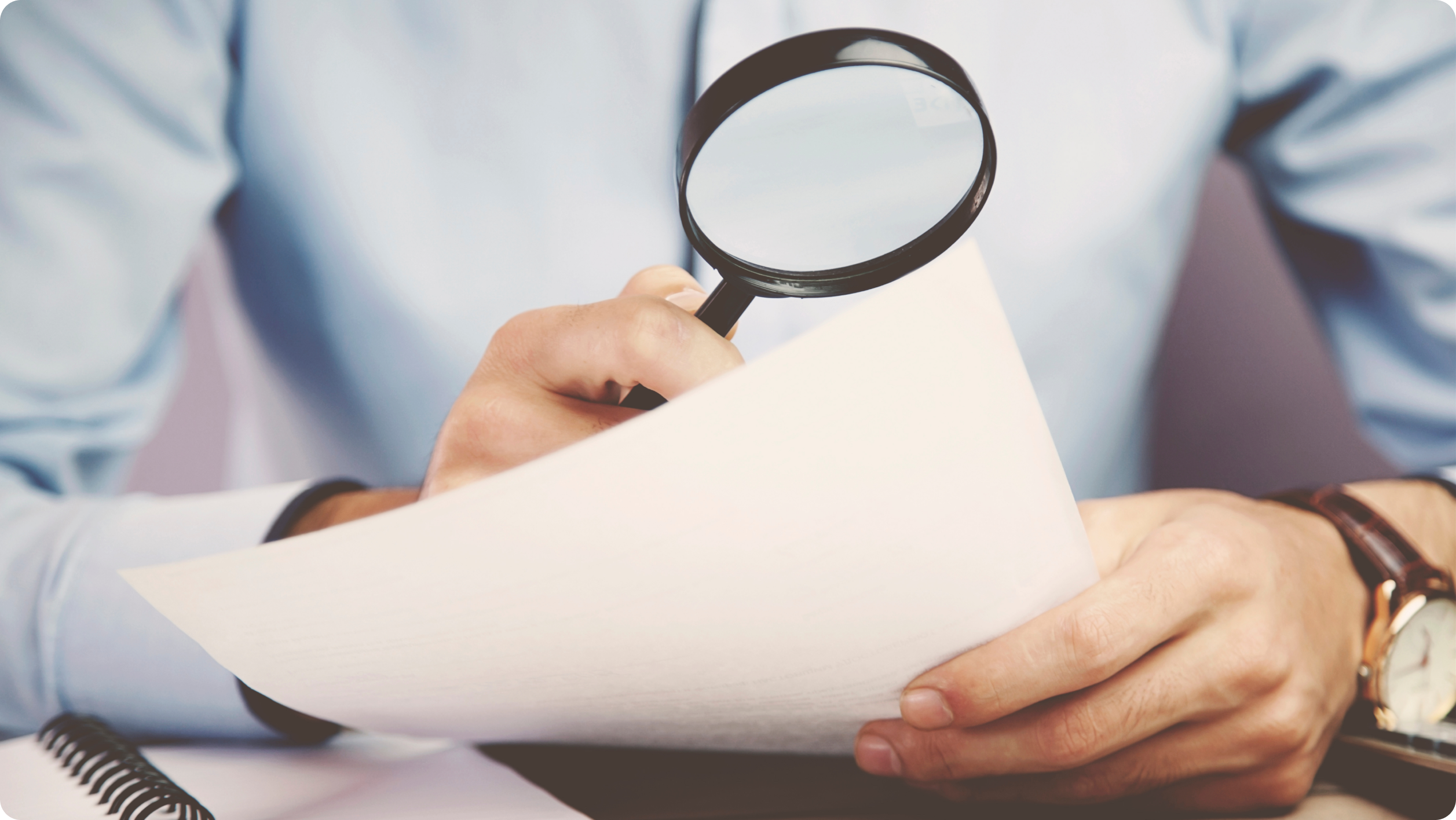 A landlord looking at a tenant background and rental history check