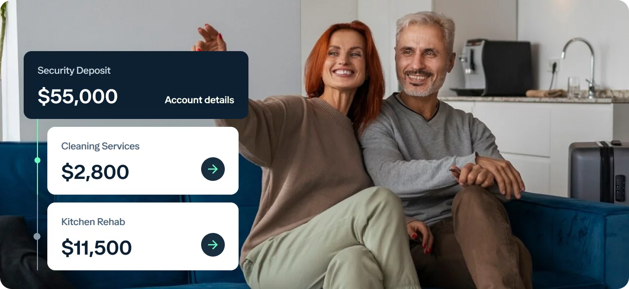 A smiling couple sits on a blue couch in a modern living room. Graphical overlays display financial information: "Security Deposit: $55,000," "Cleaning Services: $2,800," and "Kitchen Rehab: $11,500," with clickable arrows for account details.
