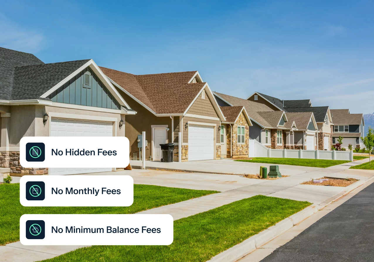 A row of modern, single-family homes with well-maintained lawns under a clear blue sky. Overlaid text reads "No Hidden Fees," "No Monthly Fees," and "No Minimum Balance Fees.