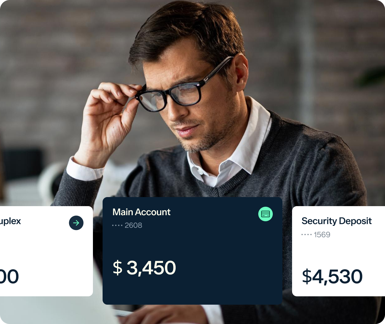 A man with a concerned expression, wearing glasses and a sweater over a collared shirt, looks at financial information. The screen displays account balances: Main Account with $3,450, and Security Deposit with $4,530.
