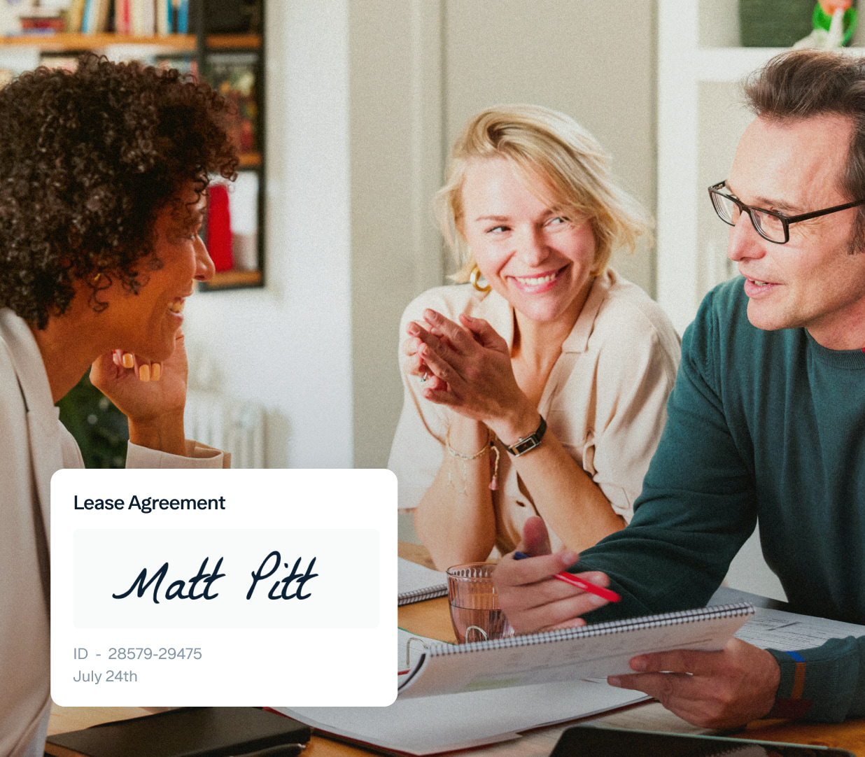 Three people engaged in a conversation, sitting around a table with documents. One woman is smiling, appearing enthusiastic. Inset shows a lease agreement labeled "Lease Agreement" signed by "Matt Pitt," with ID 28579-29475 and date July 24th.