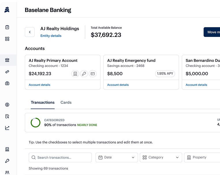 A banking dashboard showing a total available balance of $37,692.23 for AJ Realty Holdings. It lists accounts with their balances and transaction categories. The interface has menu icons on the left and transaction details at the bottom.