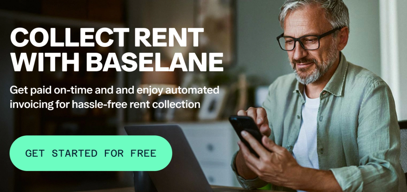 A smiling man with glasses uses his smartphone while sitting at a desk with a laptop. Large text reads, "Collect rent with Baselane—your ai bank account for real estate." A green button says, "Get started for free.